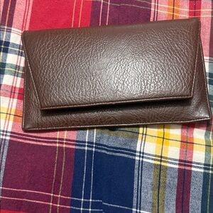Brown Leather Wallet I do think this is leather but it’s so nice not sure